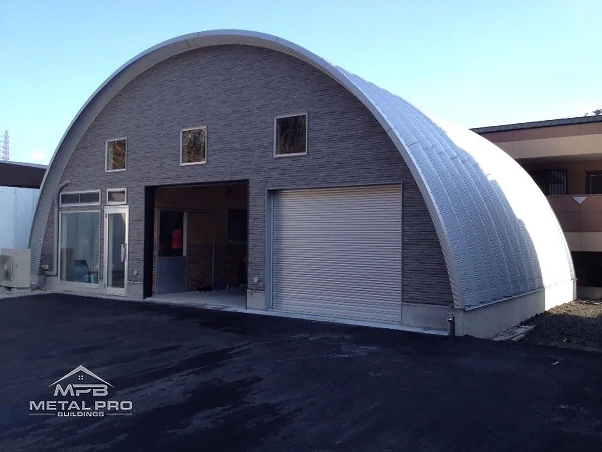 exterior of a q (arch style) model quonset building