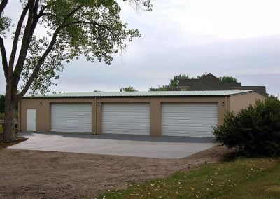 Example of one of our three door prefab garage kits for sale