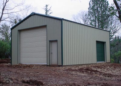 Prefab garage steel building with two doors.