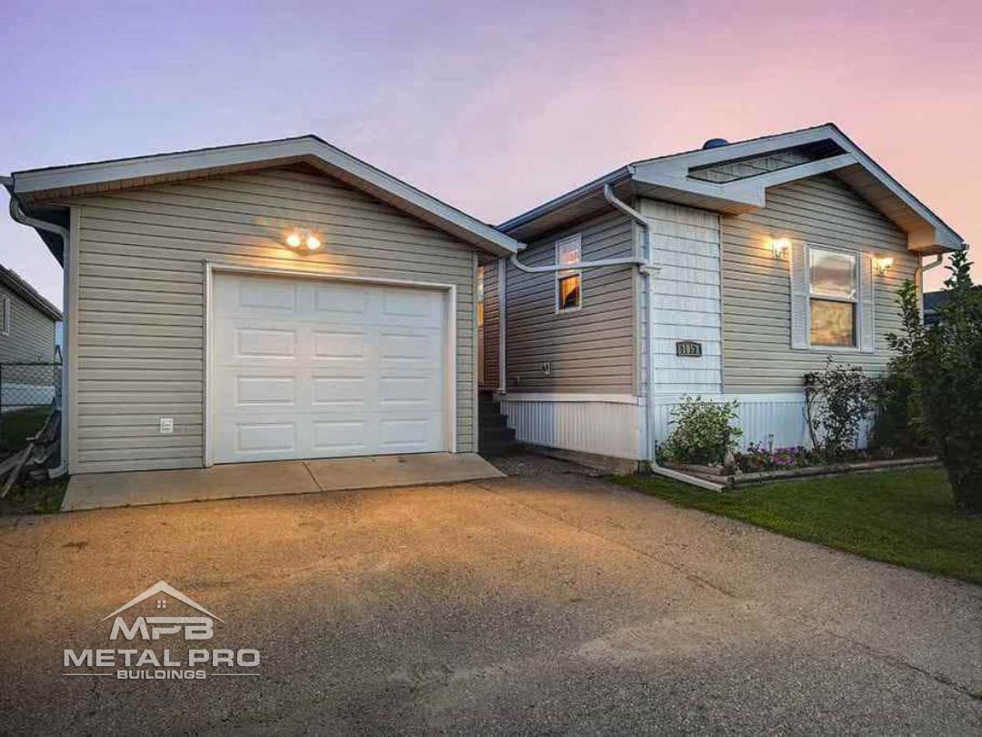 exterior of home with a detached garage building