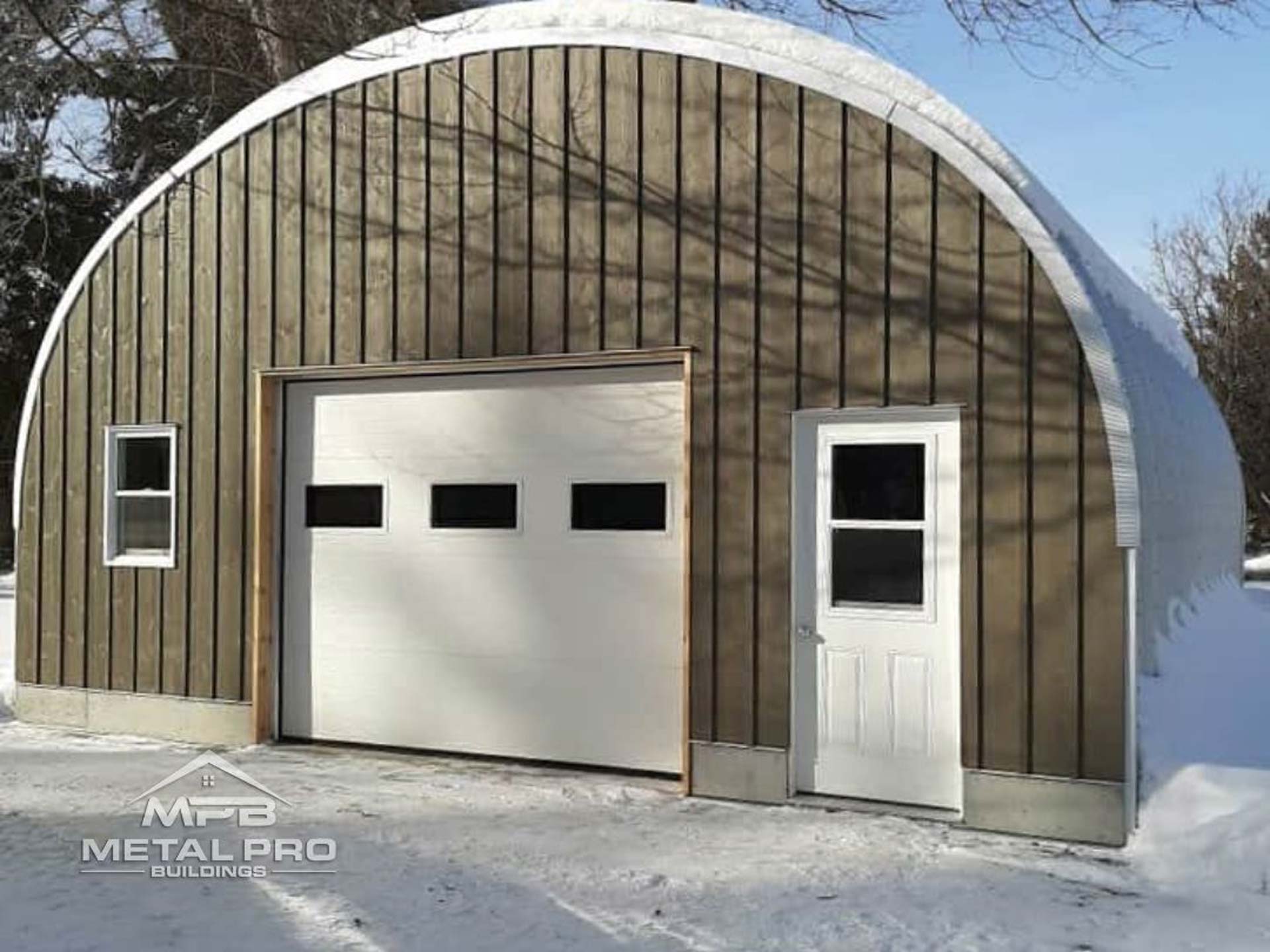 exterior of a quonset hut q (arch) model garage building