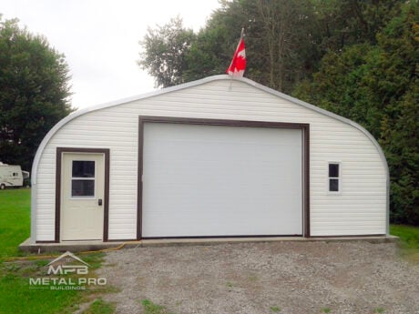 quonset hut building econospan model, white vinyl endwall with garage and entry door