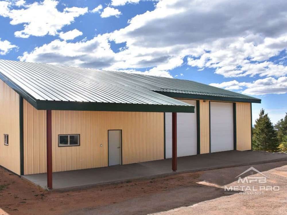 painted cfs workshop steel building with entry and garage doors