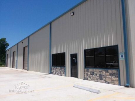 exterior of industrial steel building with stone finish