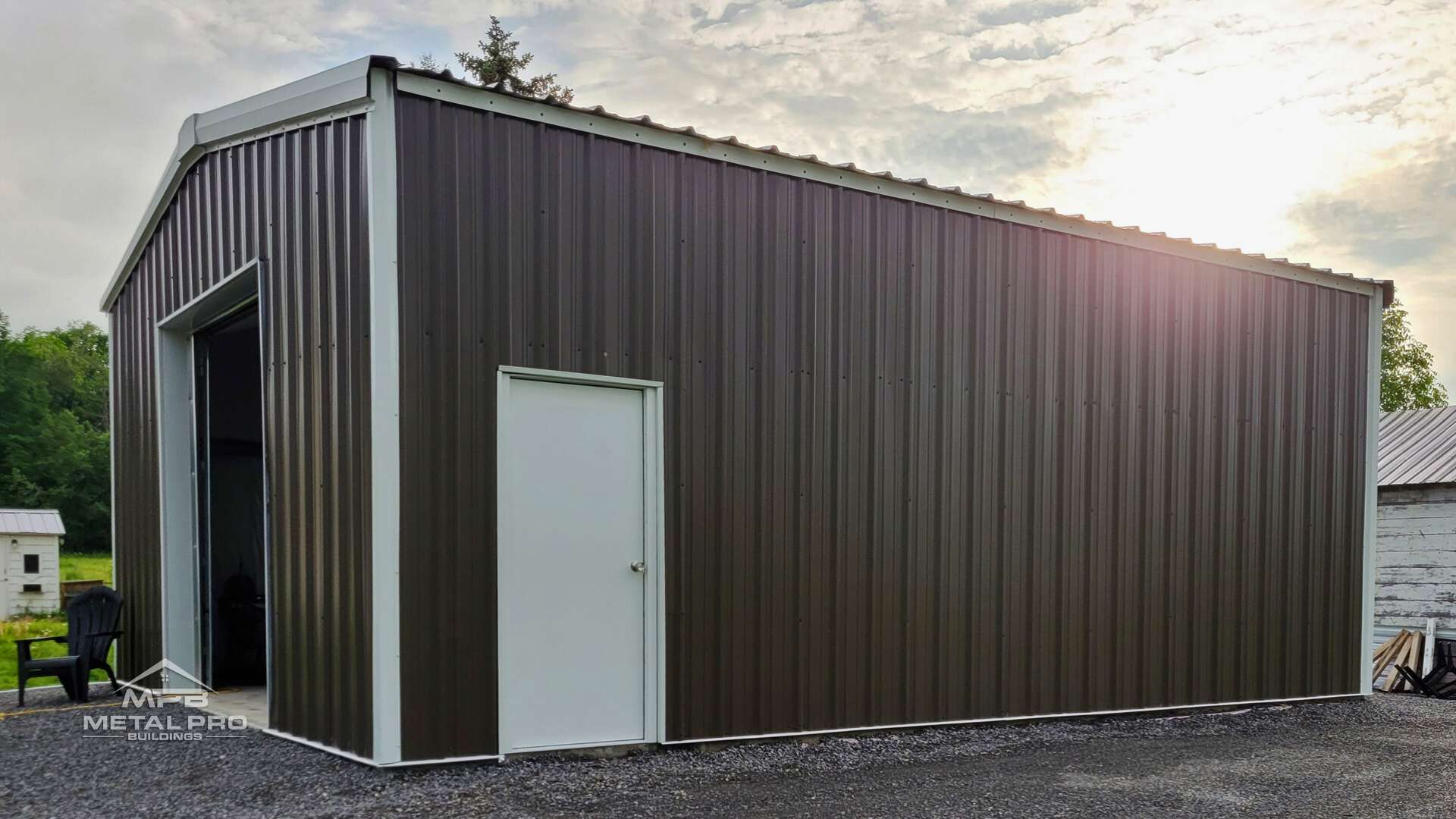 brown prefab cfs steel building kit with garage door and service door