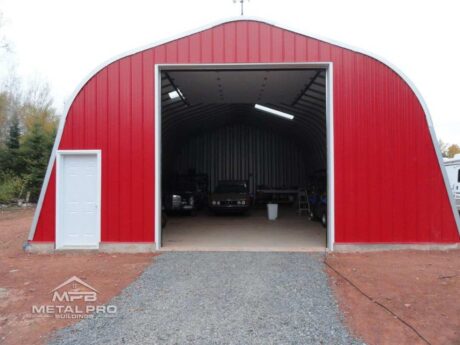 red straight wall garage building with garage door opening and entry door