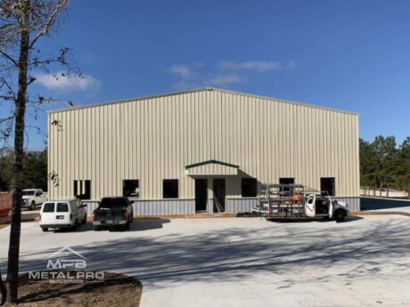 straight wall steel warehouse building with double entry doors and windows