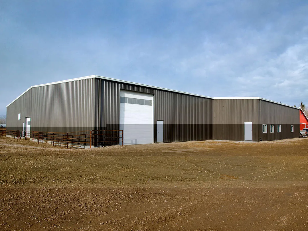 brown horse riding arena with garage door