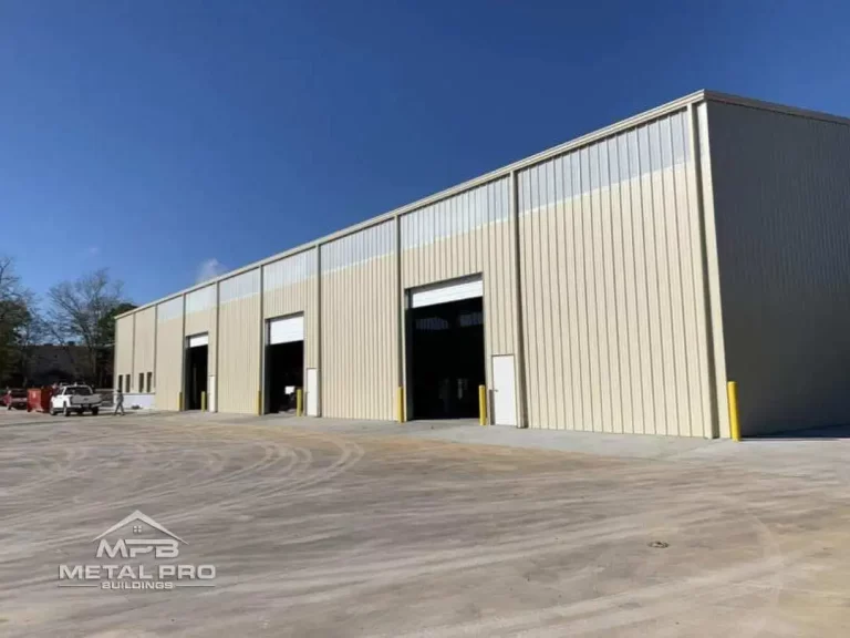 straight wall steel warehouse building with three garage doors
