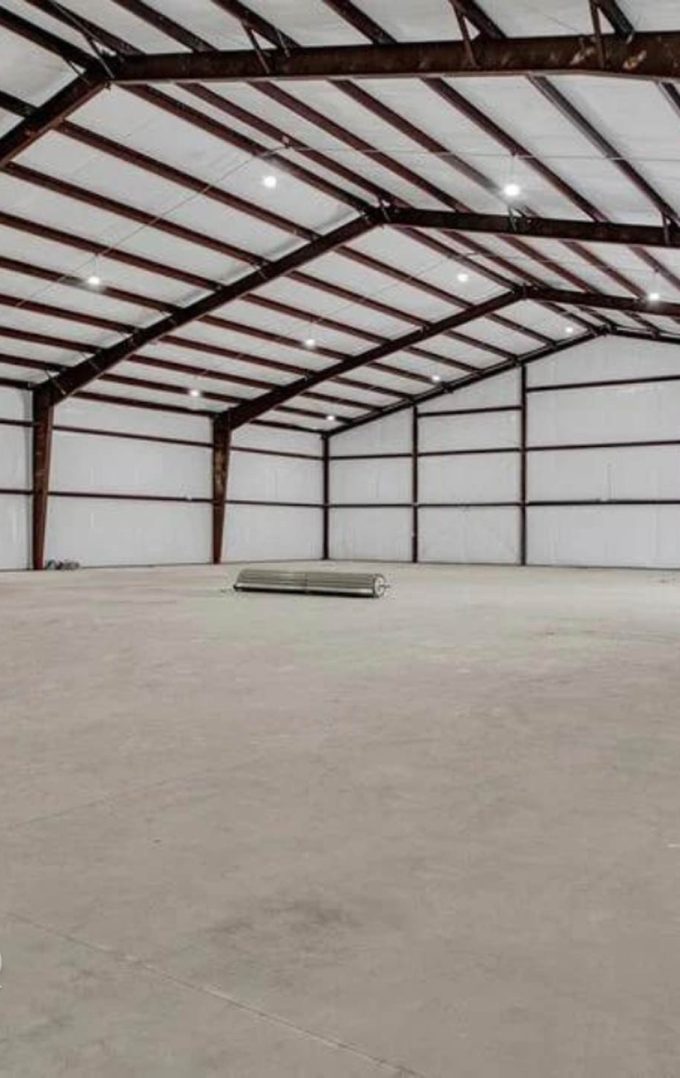 interior of a rigid farm storage building with insulation