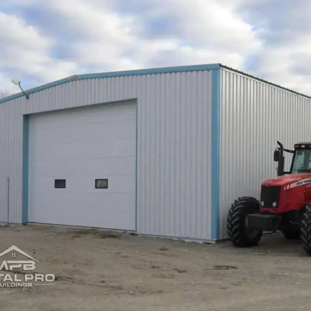 exterior of an agricultural steel building with a tractor on the side