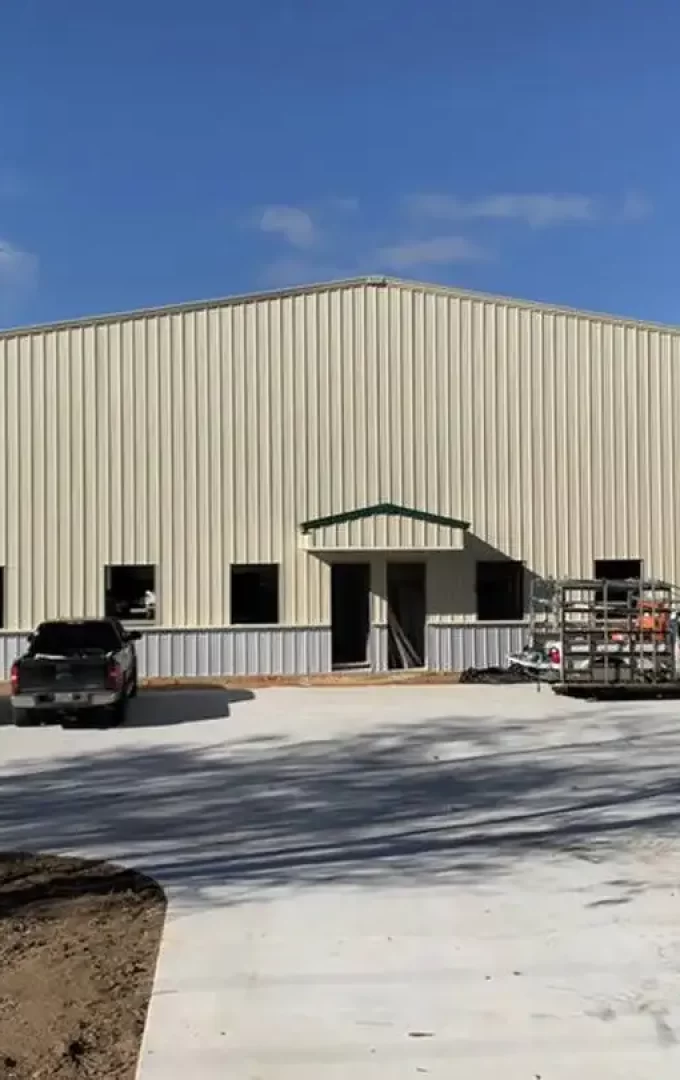 prefab steel retail building with beige coloured wall liners