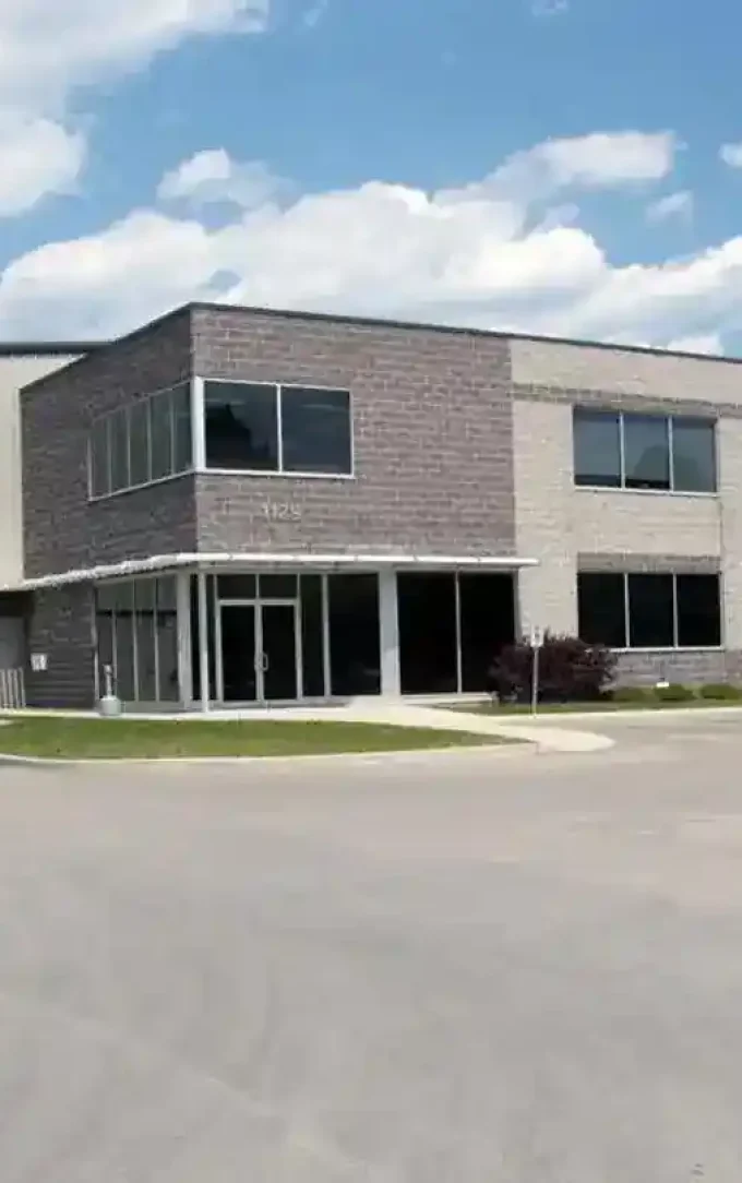 steel office building with cream coloured wall liners