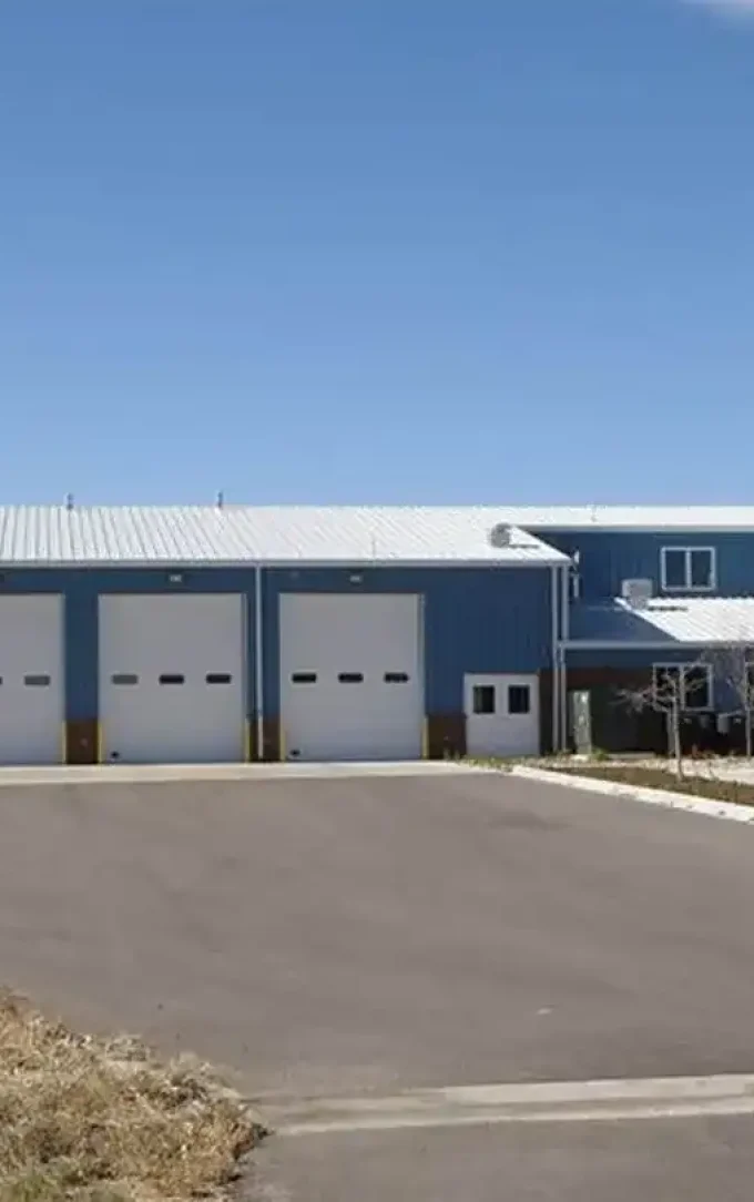 steel office building with blue and brown coloured wall liners